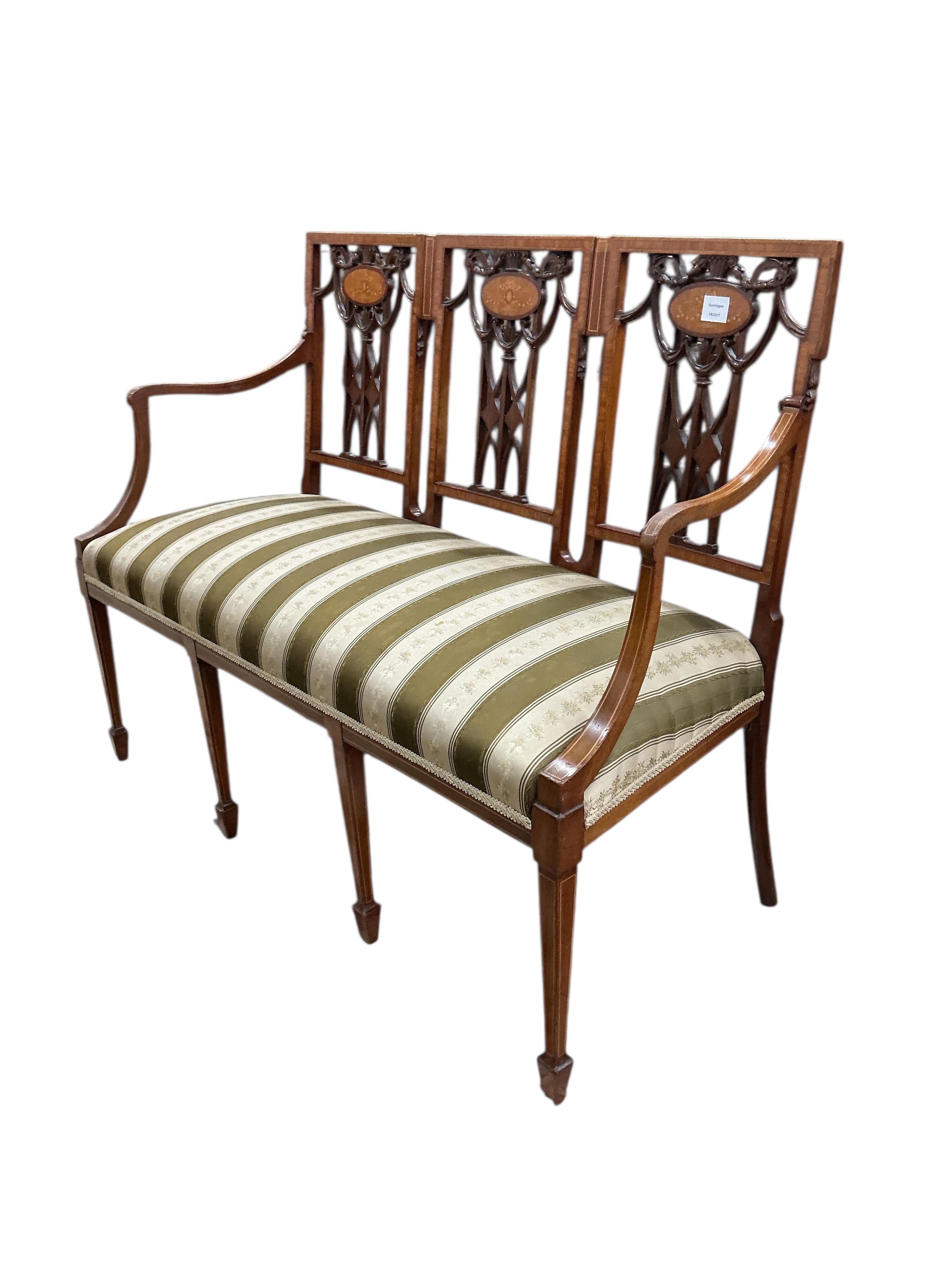 An Edwardian Sheraton Revival inlaid mahogany triple chair back settee, width 120cm, depth 50cm, height 96cm